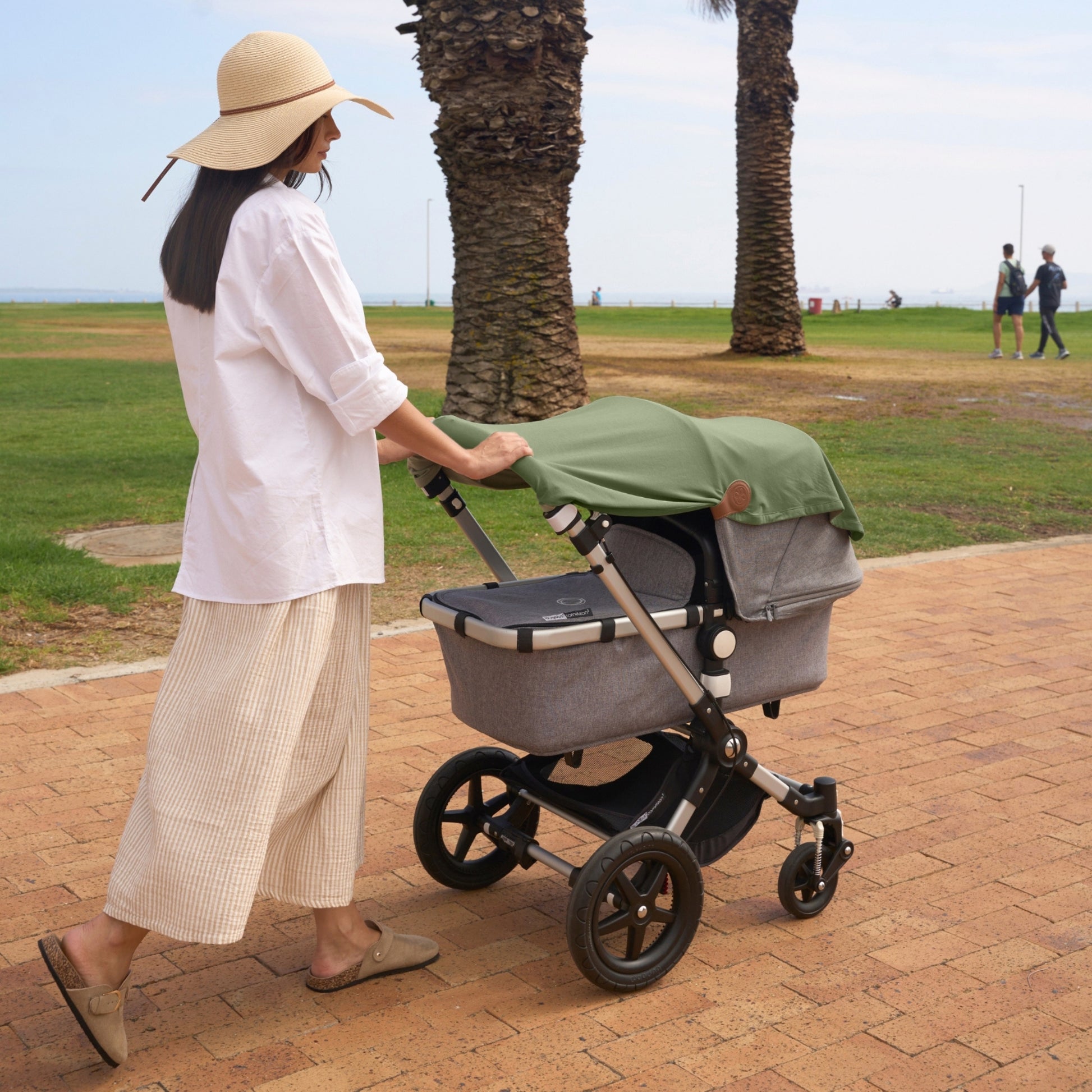Olive Green UV doek over kinderwagen
